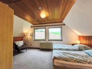 Postel nebo postele na pokoji v ubytování Holiday Home Andrea by Interhome