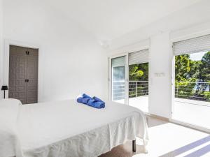 Postel nebo postele na pokoji v ubytování Villa Villa Marina by Interhome