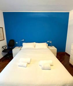 Ένα ή περισσότερα κρεβάτια σε δωμάτιο στο Accomodo MIT67 Trivano Linate