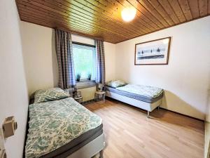 Postel nebo postele na pokoji v ubytování Holiday Home Andrea by Interhome