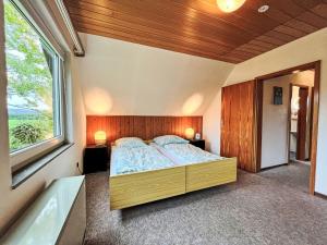 Postel nebo postele na pokoji v ubytování Holiday Home Andrea by Interhome