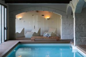 Bazén v ubytovaní Hotel Peralada Wine Spa & Golf alebo v jeho blízkosti