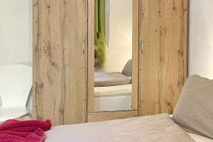 Ένα ή περισσότερα κρεβάτια σε δωμάτιο στο Baumhaus Baum 4