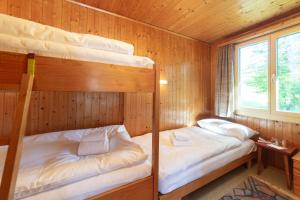 Postel nebo postele na pokoji v ubytování Dorea