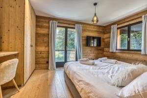 Posteľ alebo postele v izbe v ubytovaní Megève - Chalet Yack - Premium jusqu'à 15 pers