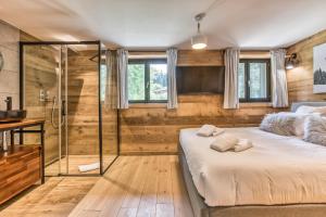 Posteľ alebo postele v izbe v ubytovaní Megève - Chalet Yack - Premium jusqu'à 15 pers