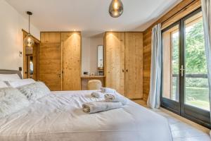 Posteľ alebo postele v izbe v ubytovaní Megève - Chalet Yack - Premium jusqu'à 15 pers