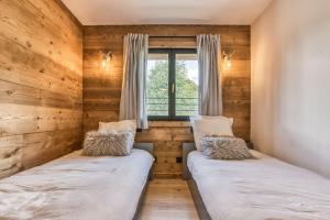 Posteľ alebo postele v izbe v ubytovaní Megève - Chalet Yack - Premium jusqu'à 15 pers