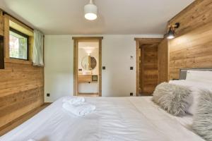 Posteľ alebo postele v izbe v ubytovaní Megève - Chalet Yack - Premium jusqu'à 15 pers