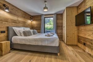 Posteľ alebo postele v izbe v ubytovaní Megève - Chalet Yack - Premium jusqu'à 15 pers