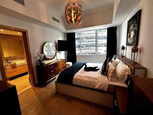 Postel nebo postele na pokoji v ubytování Beachside Sunset Residence + 37 fotografií