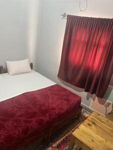 Postel nebo postele na pokoji v ubytování Taghadoute Hotel