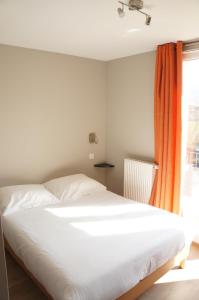 Postel nebo postele na pokoji v ubytování Chambre single à louer dans une colocation