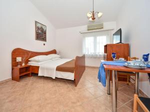 Postel nebo postele na pokoji v ubytování Apartment Delfin-11 by Interhome