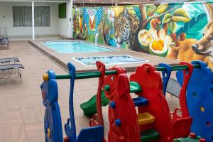A piscina em ou perto de Allegro Hotel