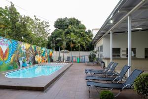 A piscina em ou perto de Allegro Hotel