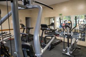 O centro de fitness e/ou as comodidades de fitness de Allegro Hotel