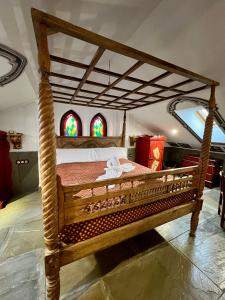 A bed or beds in a room at Posada la Leyenda