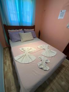 Cama ou camas em um quarto em Pousada House Nativa
