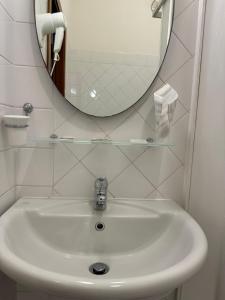 Koupelna v ubytování Albergo La Posta Arezzo + 37 fotografií