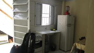 Η κουζίνα ή μικρή κουζίνα στο Chalé do Bosco +7 φωτογραφίες