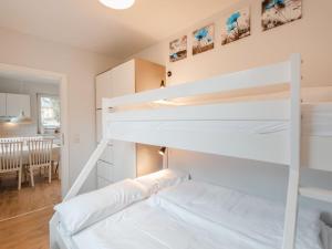 Postelja oz. postelje v sobi nastanitve Apartment Susis by Interhome