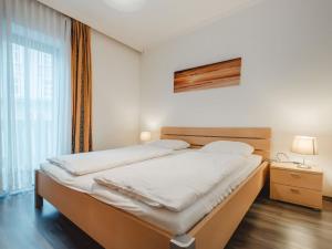 Voodi või voodid majutusasutuse Apartment Landhaus St- Georg-3 by Interhome toas
