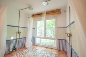 A bed or beds in a room at L'Albaida, tranquility, views of sea and mountains