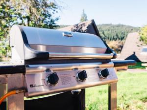 a grill with two burners on top of it at Chalet Caledonia Lodge by Interhome in Spean Bridge