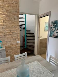 Фотография из галереи Appartamento La Pelosa в Стинтино