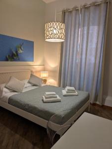 Posteľ alebo postele v izbe v ubytovaní Gracchi 278 - The Italian Stay Collection