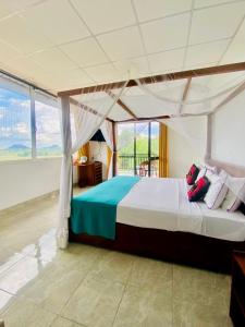 Postel nebo postele na pokoji v ubytování Organic Garden Resort Sigiriya