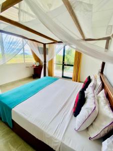 Postel nebo postele na pokoji v ubytování Organic Garden Resort Sigiriya