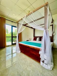 Postel nebo postele na pokoji v ubytování Organic Garden Resort Sigiriya