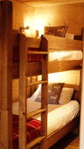 a couple of bunk beds in a cabin at Chalet Mimi in Morzine