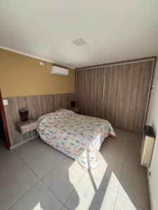 Ένα ή περισσότερα κρεβάτια σε δωμάτιο στο Departamento Centro