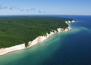 an aerial view of a beach and the ocean at Hotel Rügen Park KG in Gingst