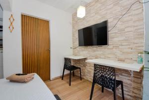 TV a/nebo společenská místnost v ubytování Studio one