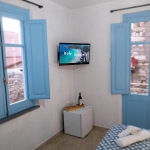 TV a/nebo společenská místnost v ubytování Paradice in Baunei