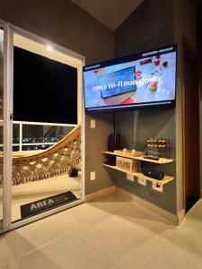 TV a/nebo společenská místnost v ubytování Reserva 1202 - Hospedagem