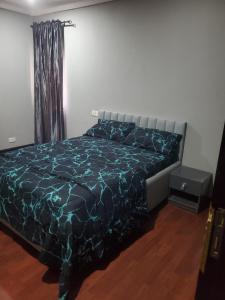 Postel nebo postele na pokoji v ubytování Dee service apartment