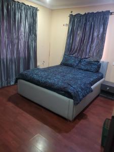 Postel nebo postele na pokoji v ubytování Dee service apartment