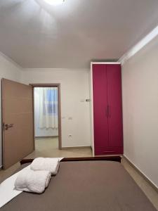 Postel nebo postele na pokoji v ubytování Villa Noah