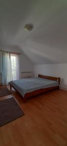 Postel nebo postele na pokoji v ubytování Simonfi Villa