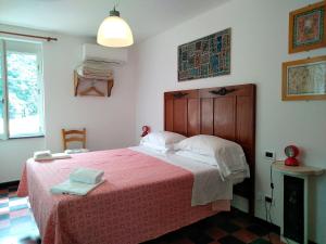 Postel nebo postele na pokoji v ubytování Hotel Gianni Franzi