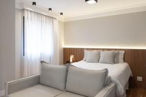 A bed or beds in a room at Jerônimo da Veiga 248 - Flat 1301