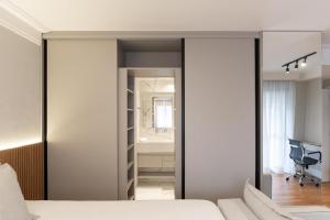 A bed or beds in a room at Jerônimo da Veiga 248 - Flat 1301
