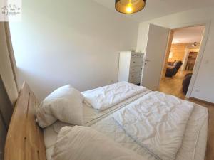 Postel nebo postele na pokoji v ubytování Alpine Tauplitz TOP 5