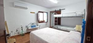 Postel nebo postele na pokoji v ubytování Alojamiento Cehegín Simón 2