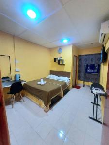 Irama Resort Amir YJS , Pantai Irama Bachok客房内的一张或多张床位